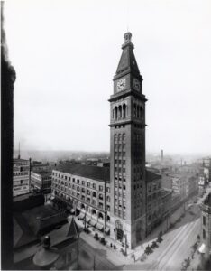 Downtown Denver's May D&F building in black and white. 