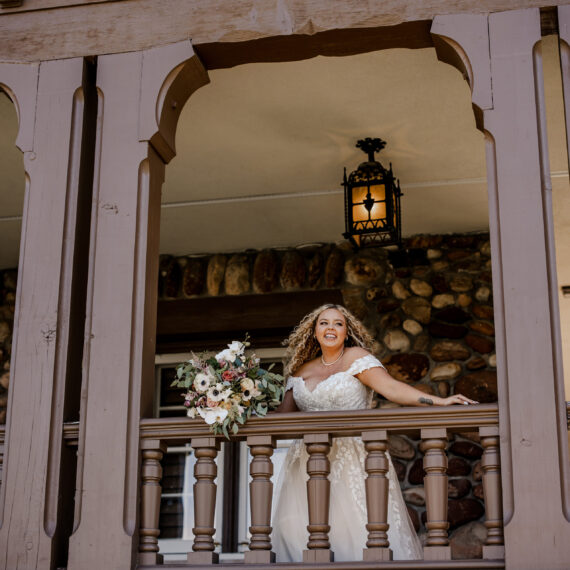 A bride looks over the Veranda patio.