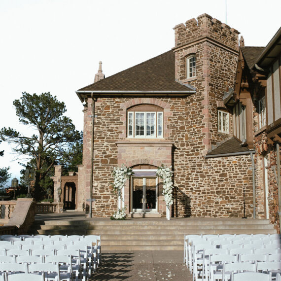 The Veranda set for ceremony with petals lining the aisle.