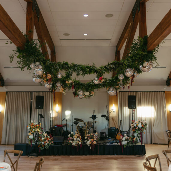 A live band set up on stage in the Great Hall.